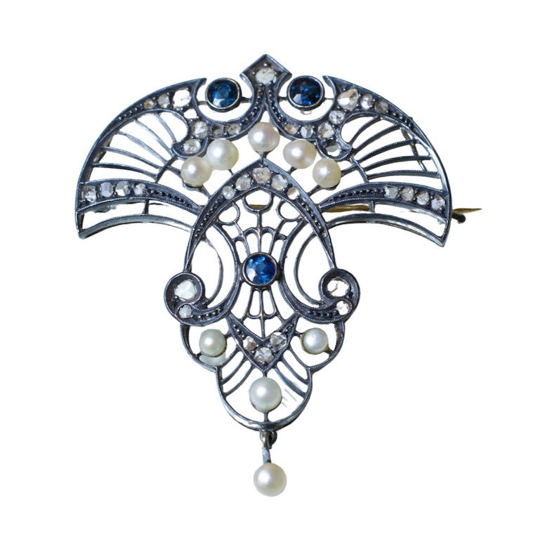 Broche en or, argent, perles, saphirs et diamants