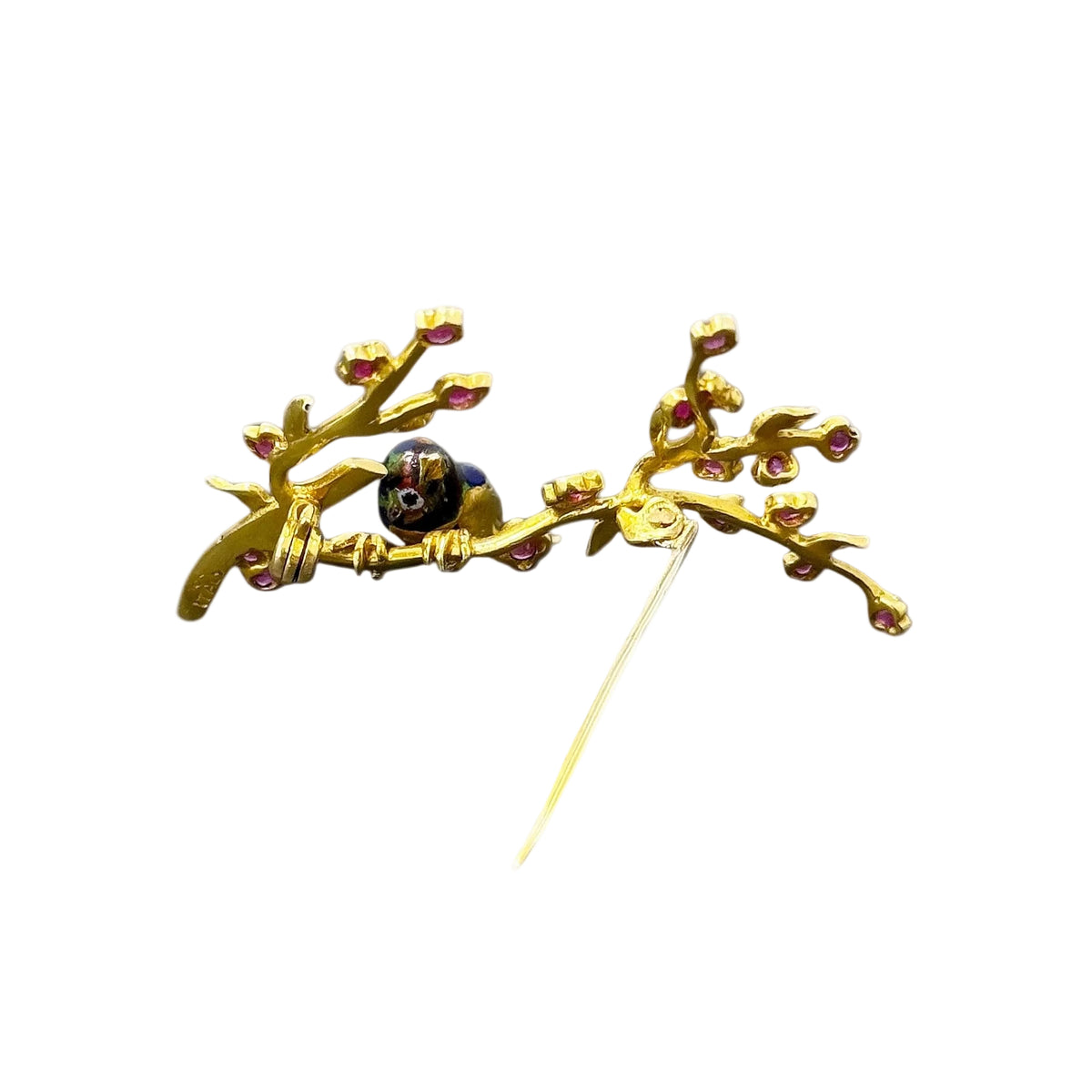 Broche oiseau dans un cerisier