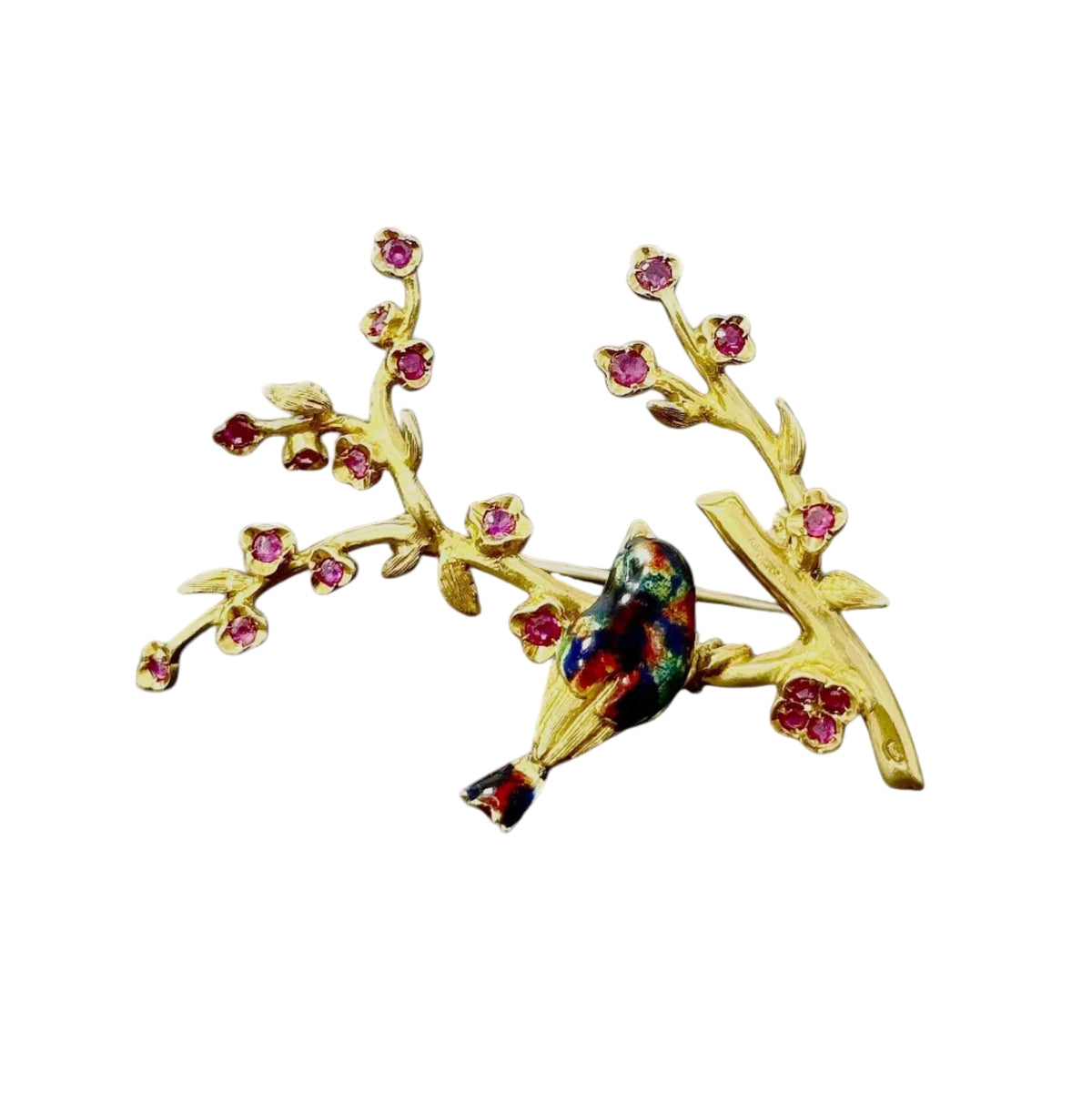 Broche oiseau dans un cerisier