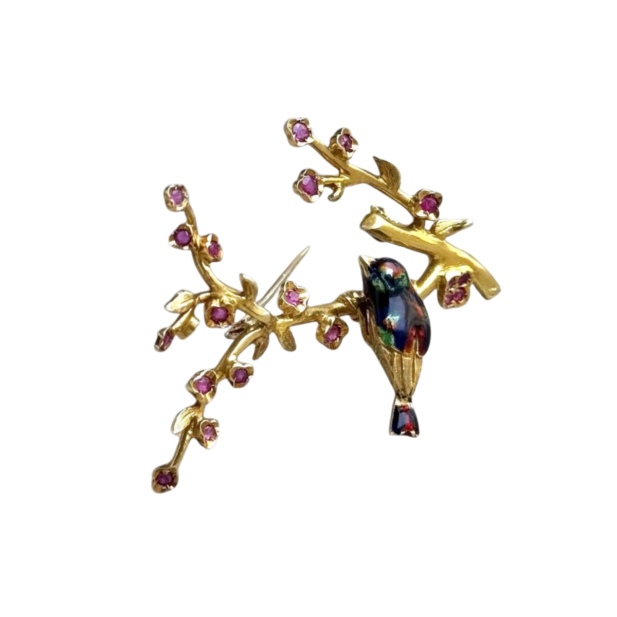 Broche oiseau dans un cerisier