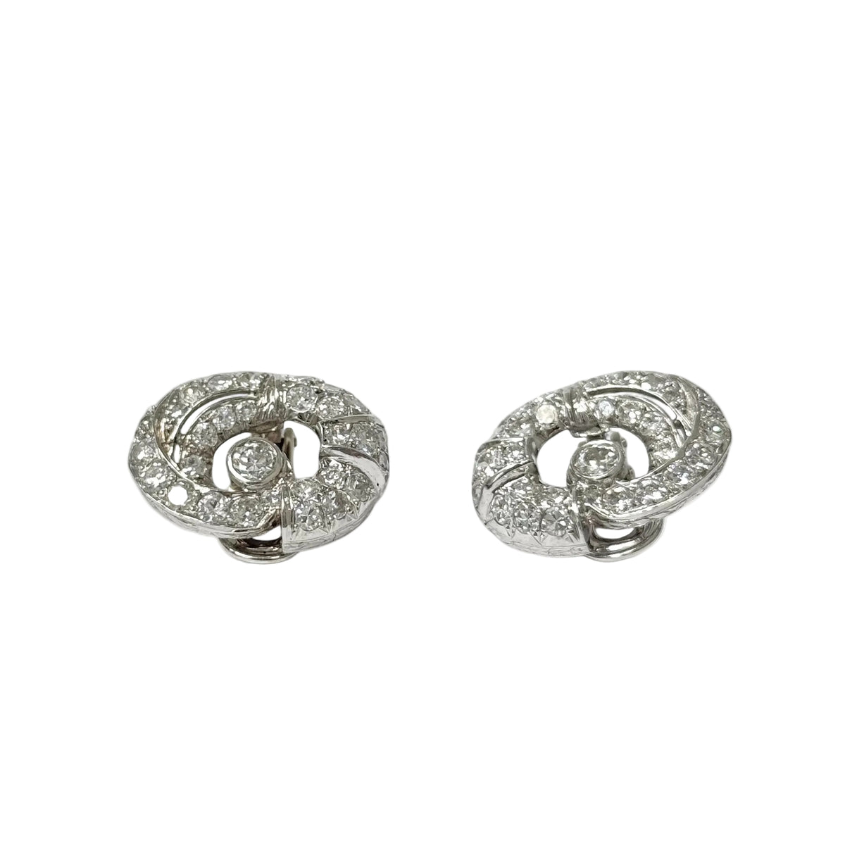 Clips d'oreilles platine et diamants