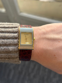 Montre BOUCHERON "Reflet" en or jaune et acier