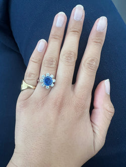 Bague Marguerite en platine, saphir et diamants