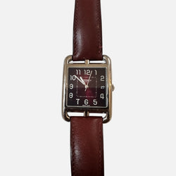 Montre HERMÈS en acier, cuir et quartz