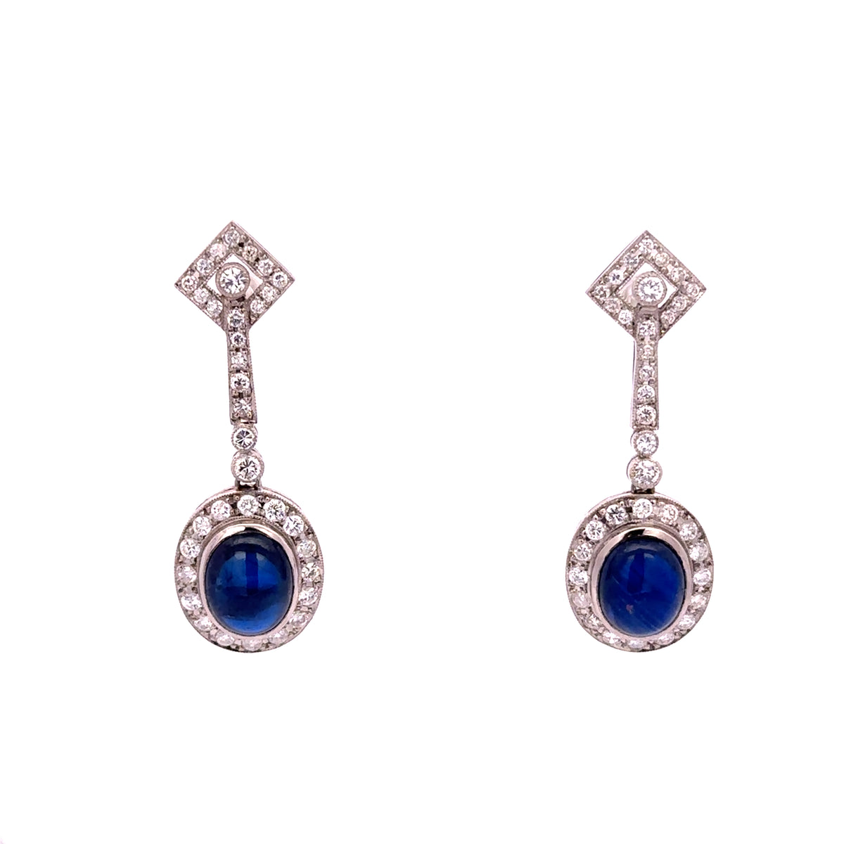 Boucles d'oreilles Pendantes en platine, saphirs et diamants