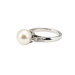 Bague Solitaire en or blanc, perle et diamants
