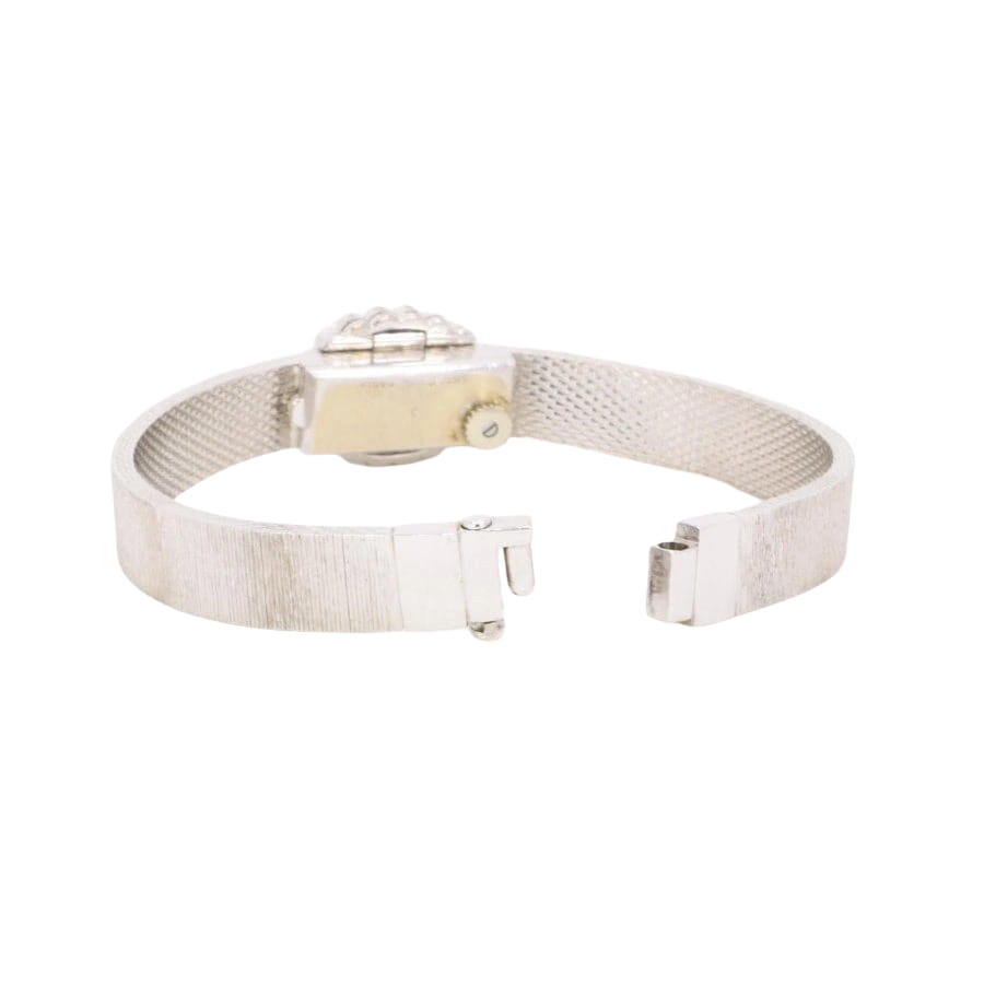 ANDRE COL Montre à secret or blanc diamants - Castafiore