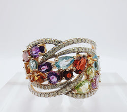 ANILLO TUTTI FRUTTI CON VARIEDAD DE GEMAS, TOPACIOS GRANATES, PERIDOTOS, AMATISTAS Y DIAMANTES - Castafiore