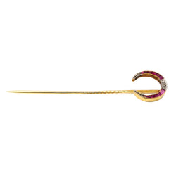 Broche en or jaune, rubis et diamants