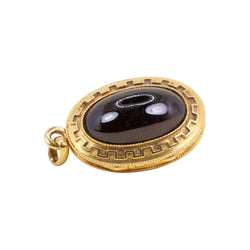 Pendentif en or jaune et grenat