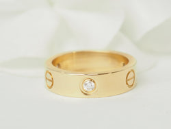 Bague Alliance CARTIER "Love" en or jaune et diamants - Castafiore
