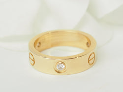 Bague Alliance CARTIER "Love" en or jaune et diamants - Castafiore