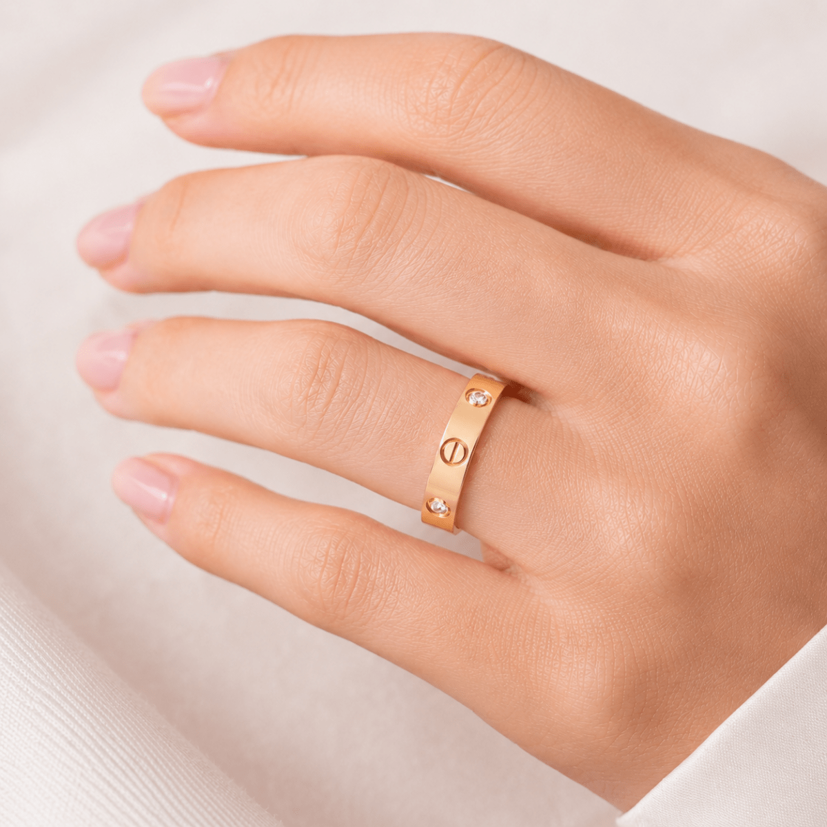 Bague Alliance CARTIER "Love" en or rose et diamants - Castafiore