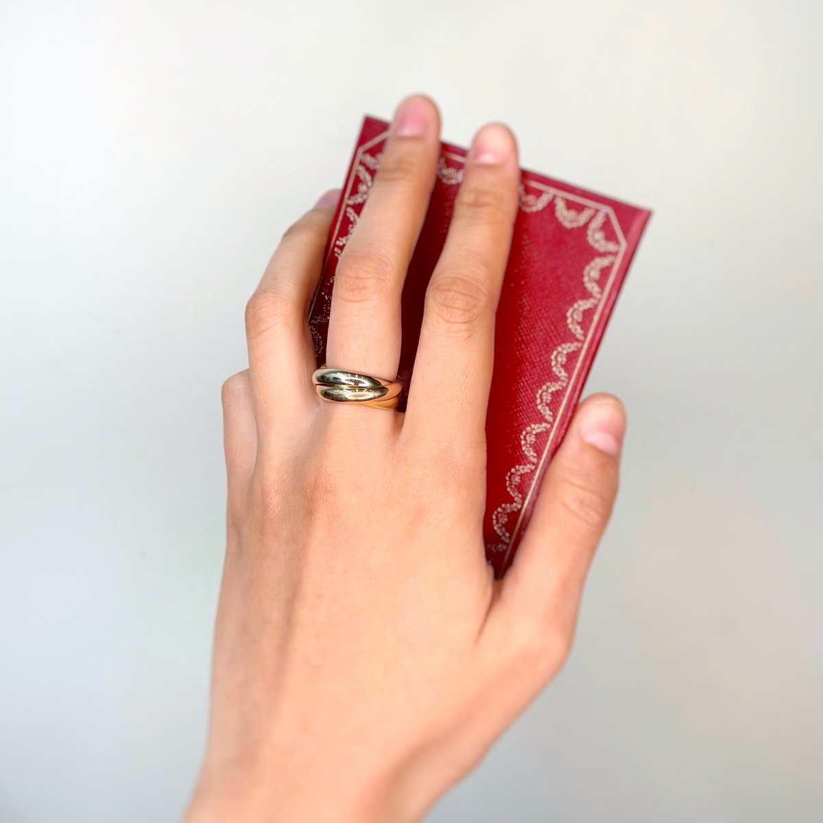 Bague Alliance CARTIER "Trinity" en or jaune, or blanc, et or rose - Castafiore
