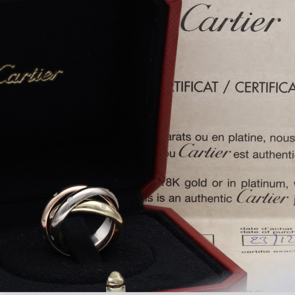 Bague Alliance CARTIER "Trinity" en or jaune, or blanc, or rose et diamants - Castafiore