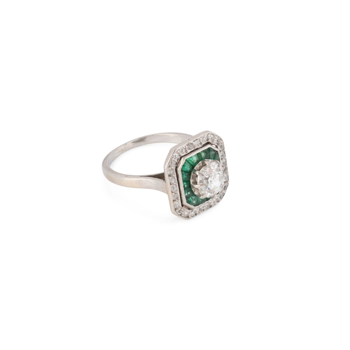 Bague Art déco en platine, émeraudes et diamants - Castafiore