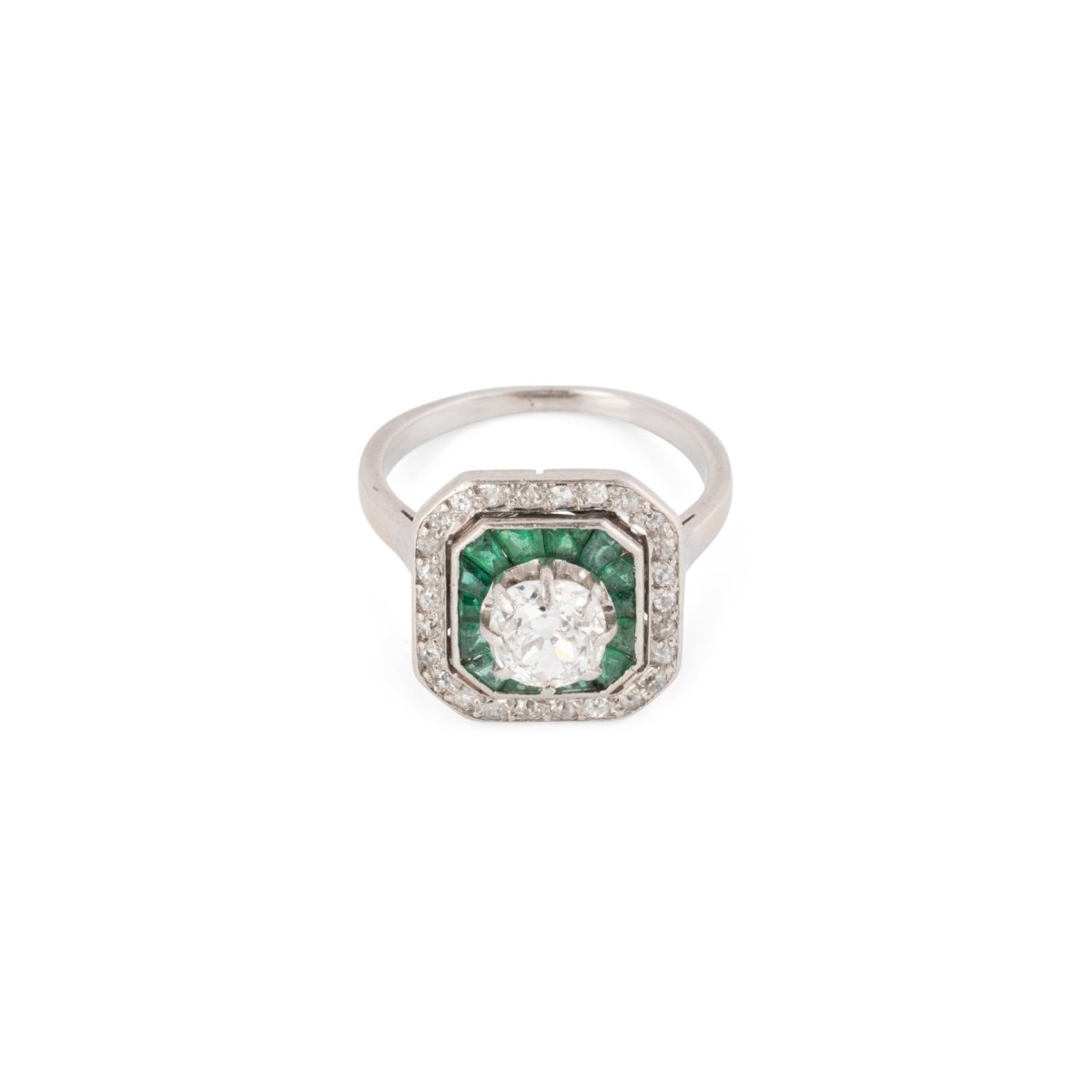 Bague Art déco en platine, émeraudes et diamants - Castafiore