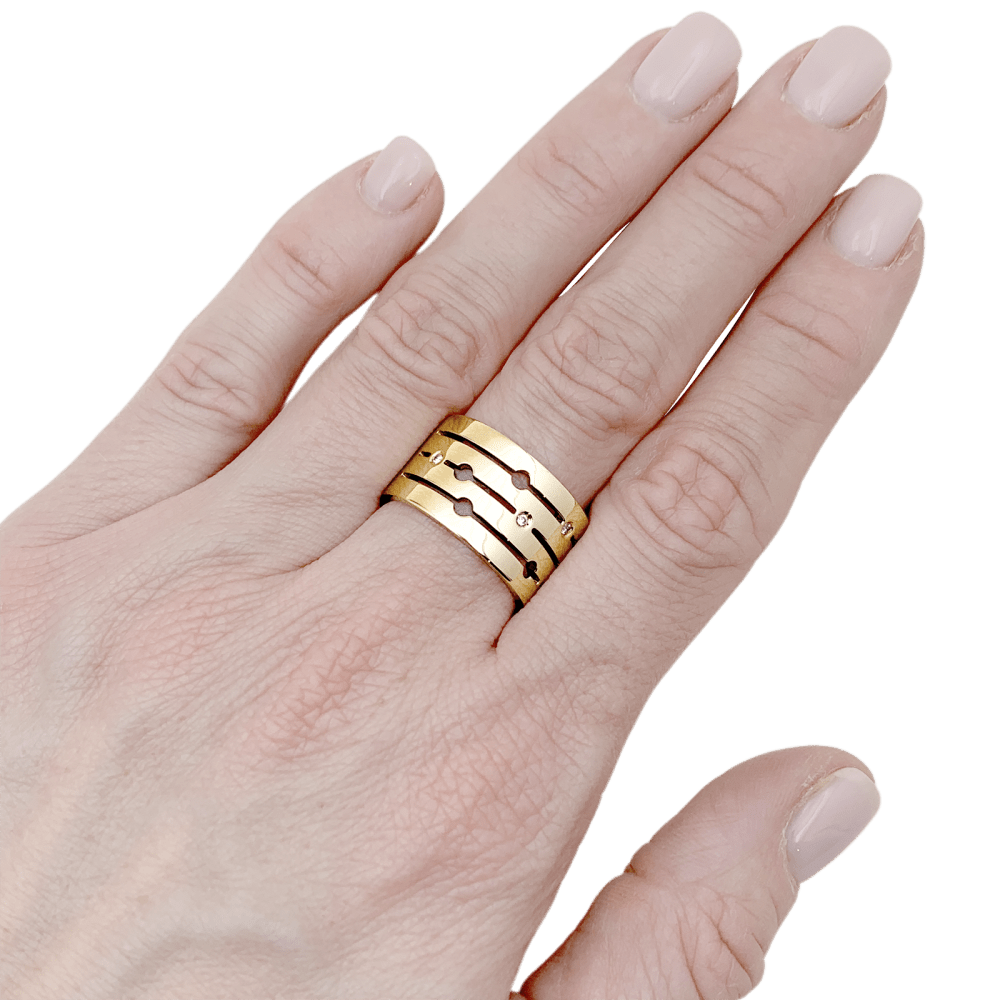 Bague Bandeau DINH VAN "Pulse" en or rose et diamants - Castafiore