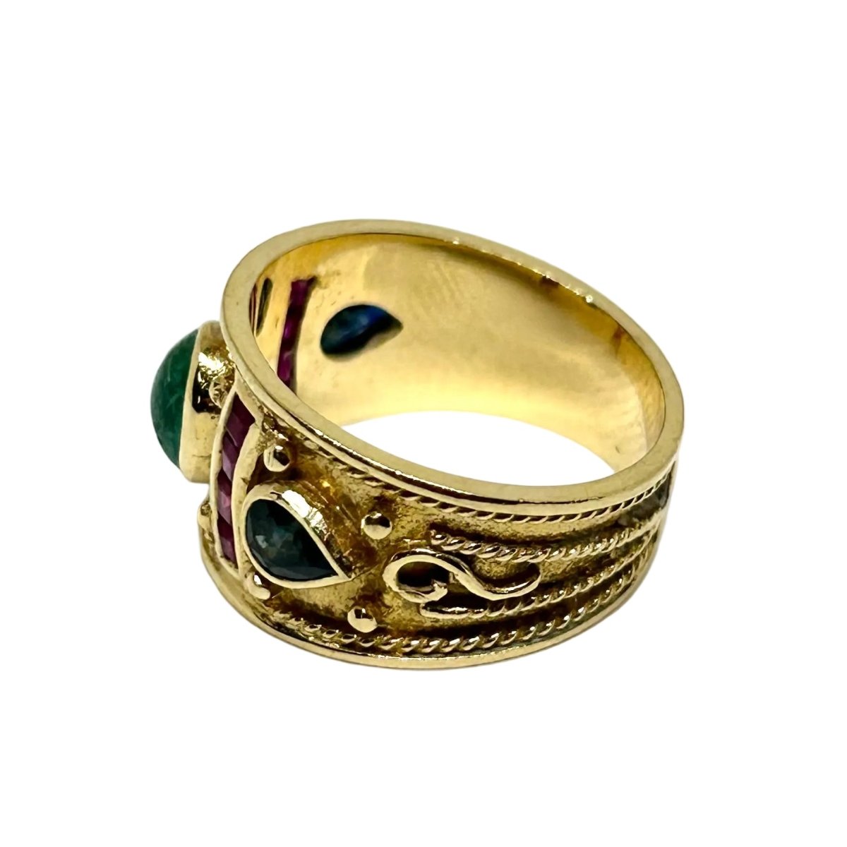 Bague Bandeau en or jaune, émeraude, rubis et saphirs - Castafiore