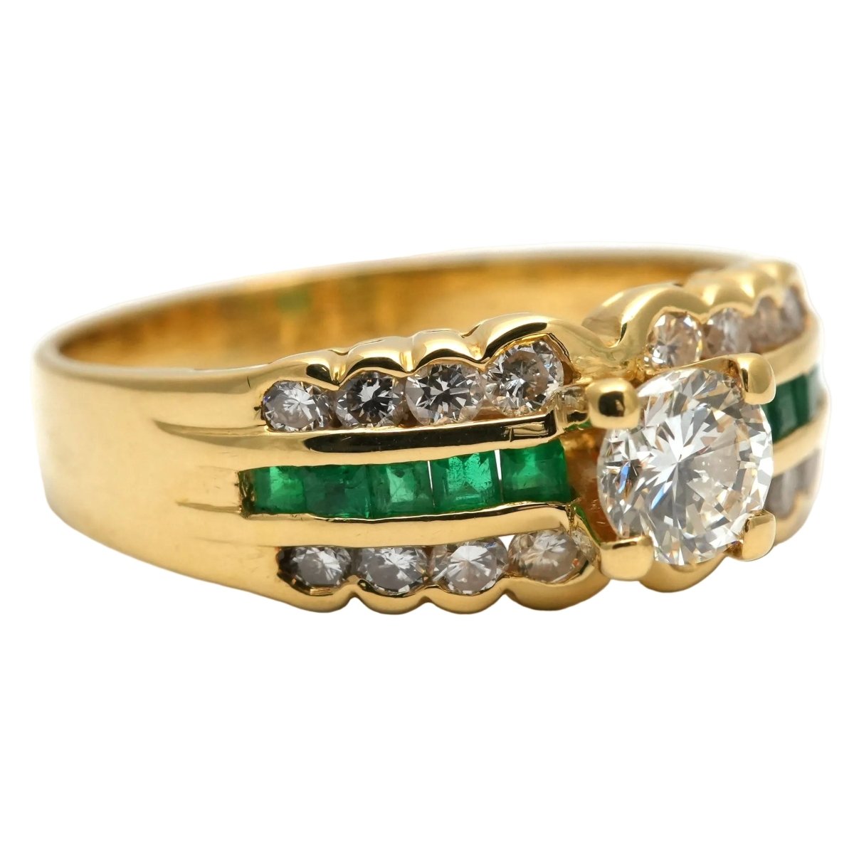 Bague Bandeau en or jaune, émeraudes et diamants - Castafiore