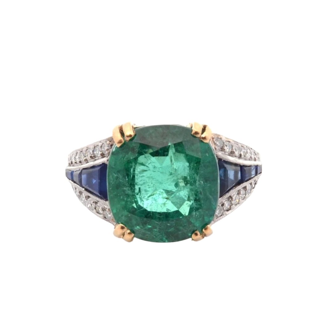 Bague Bandeau en platine et or jaune, émeraude, saphirs et diamants - Castafiore