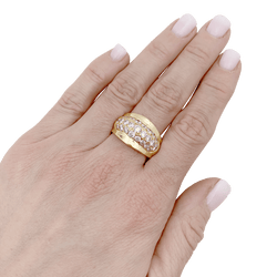Bague bombée en or jaune et diamants. - Castafiore