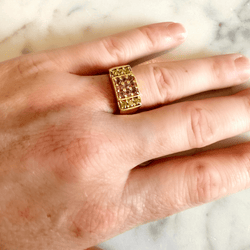 Bague chevalière en or jaune et améthyste et péridot - Castafiore