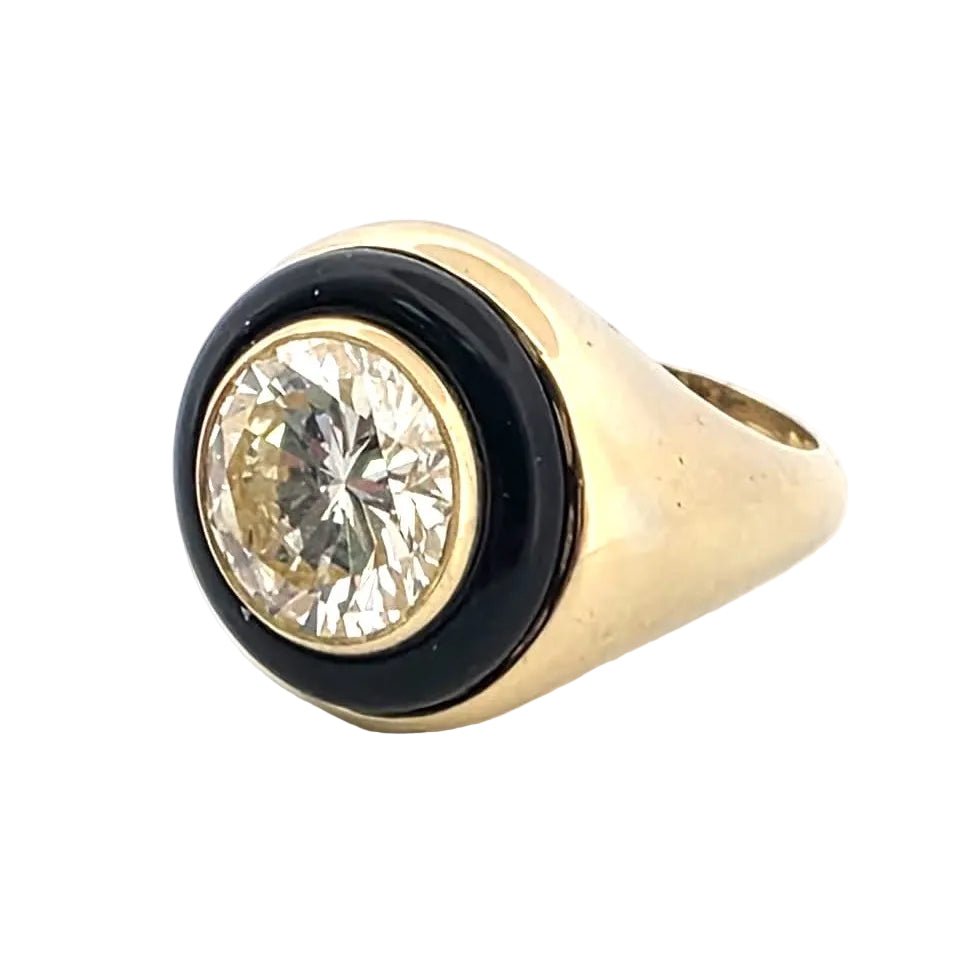 Bague Chevalière en or jaune, onyx et diamant - Castafiore