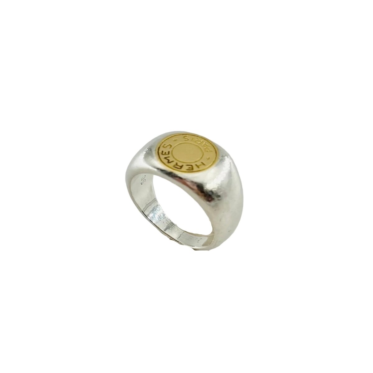 Bague Chevalière HERMÈS "Clou de selle" en argent et or jaune - Castafiore