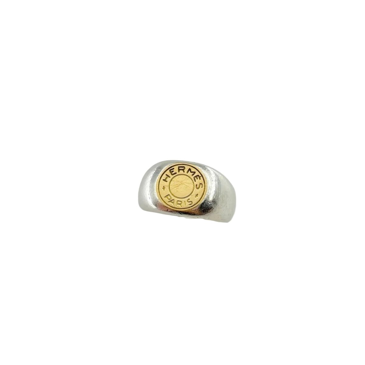 Bague Chevalière HERMÈS "Clou de selle" en argent et or jaune - Castafiore
