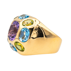 Bague Cocktail en or jaune, améthyste, péridots et topaze - Castafiore