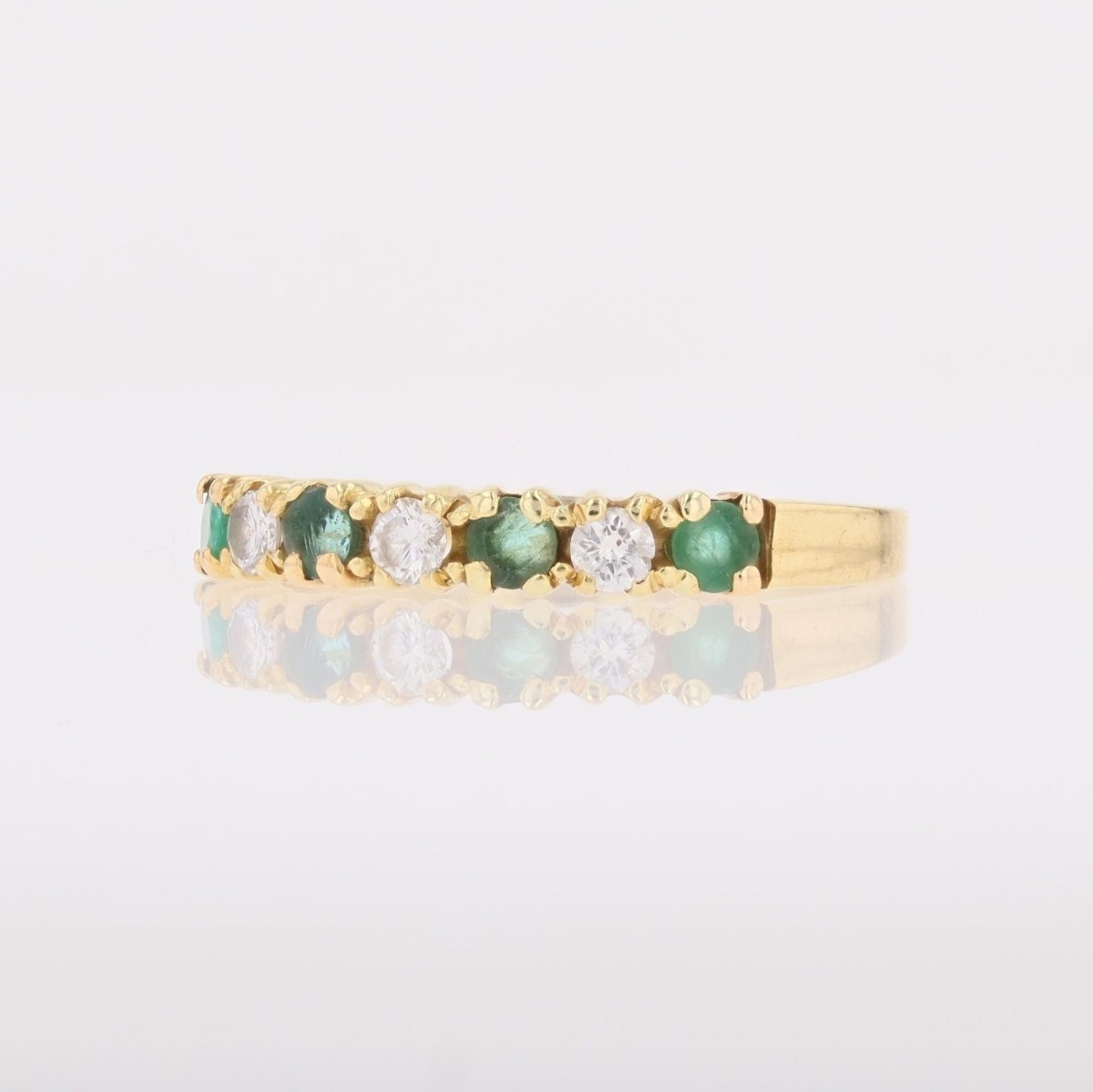 Bague demi alliance en or jaune et émeraudes diamants - Castafiore