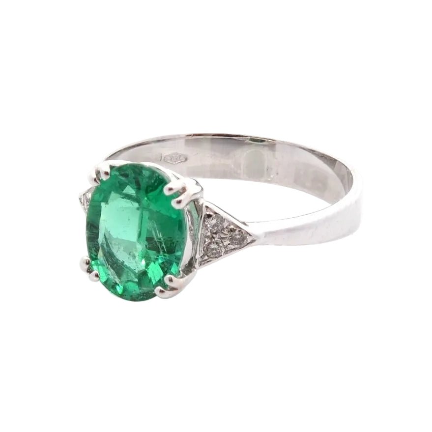 Bague en or blanc, émeraude et diamants - Castafiore