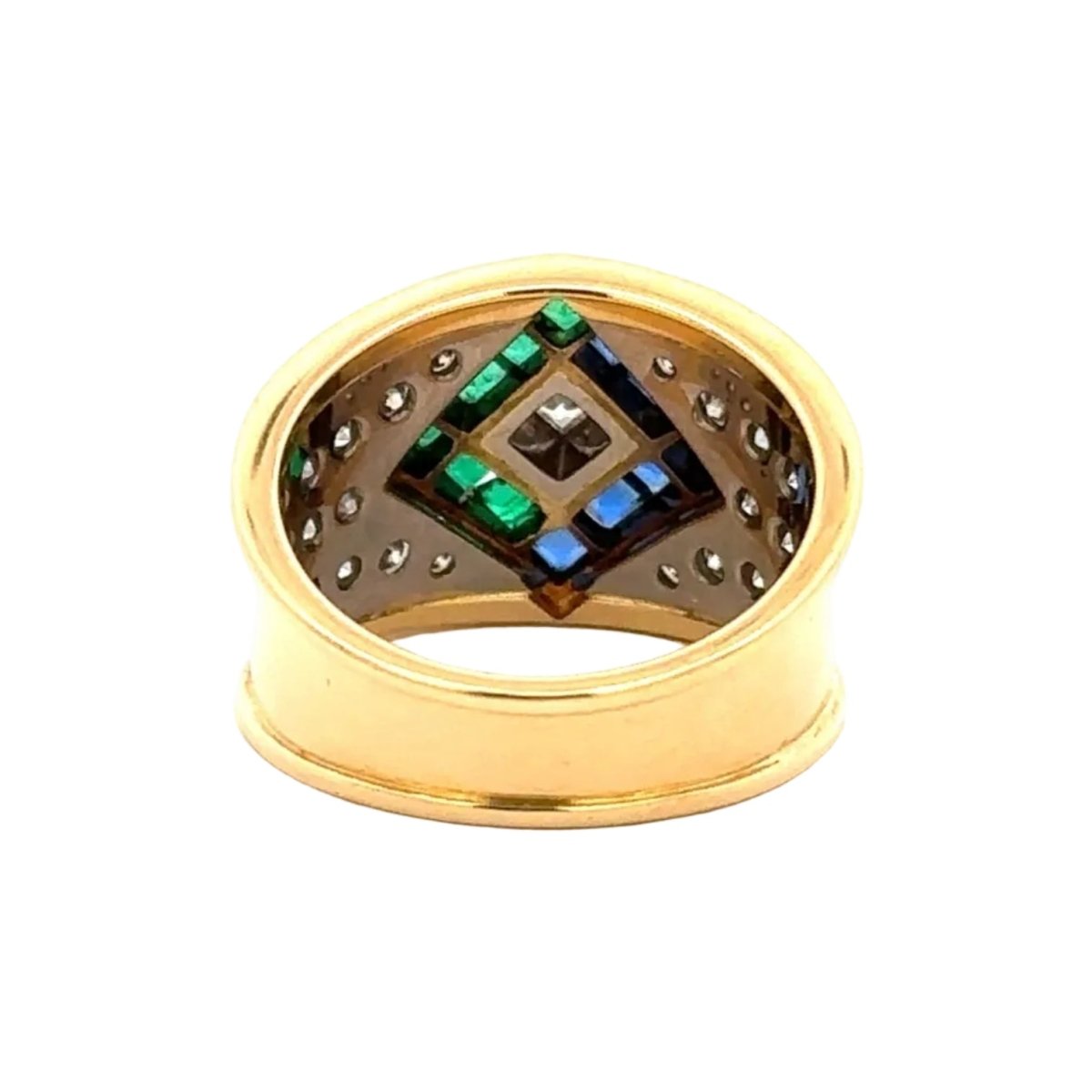 Bague en or blanc, or jaune, saphirs, émeraudes et diamants - Castafiore
