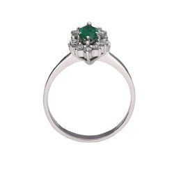 Bague en or gris 18k avec emeraude marquise et diamants brillants vers 2000. Taille 53. - Castafiore