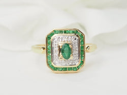 Bague en or jaune, émeraude et diamants - Castafiore
