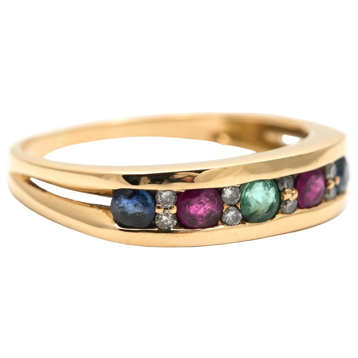 Bague en or jaune, émeraude, rubis, saphirs et diamants - Castafiore