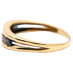 Bague en or jaune, émeraude, rubis, saphirs et diamants - Castafiore
