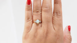 Bague en or jaune opale ovale et diamants - Castafiore