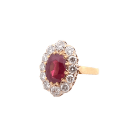 Bague en or jaune, platine, rubis et diamants - Castafiore