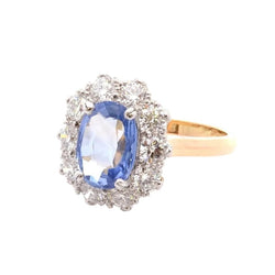 Bague en or jaune, platine, saphir et diamants - Castafiore