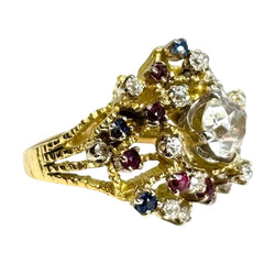 Bague en or jaune, rubis, saphirs et diamants - Castafiore