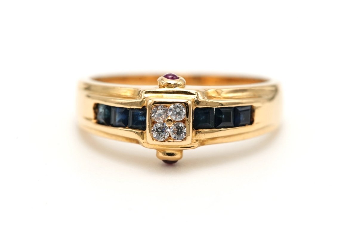 Bague en or jaune, saphirs, rubis et diamants - Castafiore