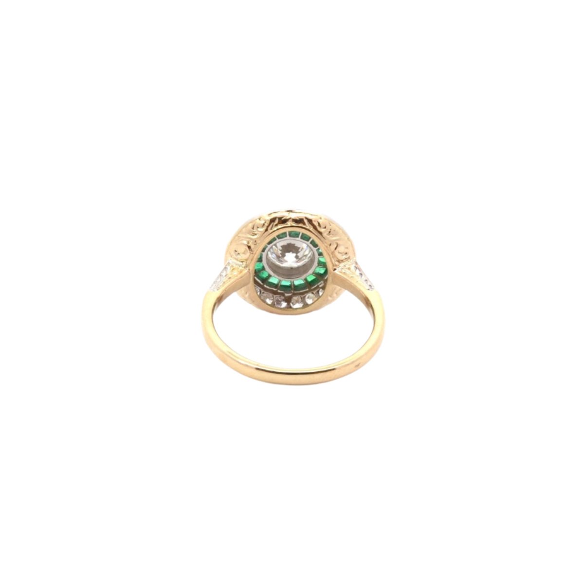 Bague Entourage Art déco en or blanc, platine, émeraudes et diamants - Castafiore