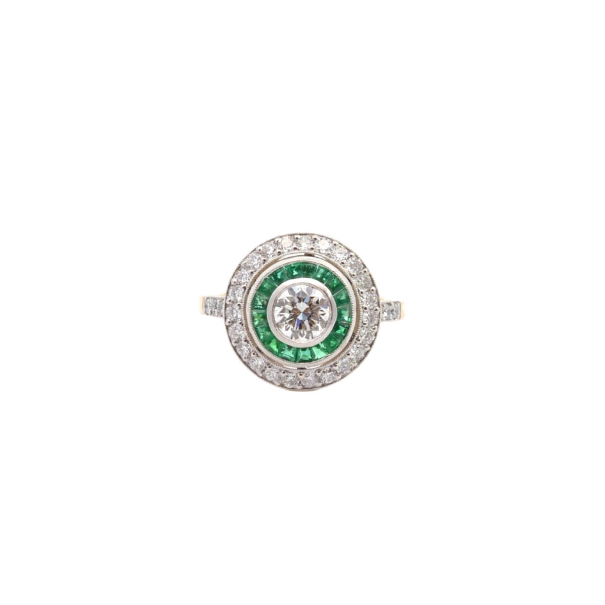 Bague Entourage Art déco en or blanc, platine, émeraudes et diamants - Castafiore