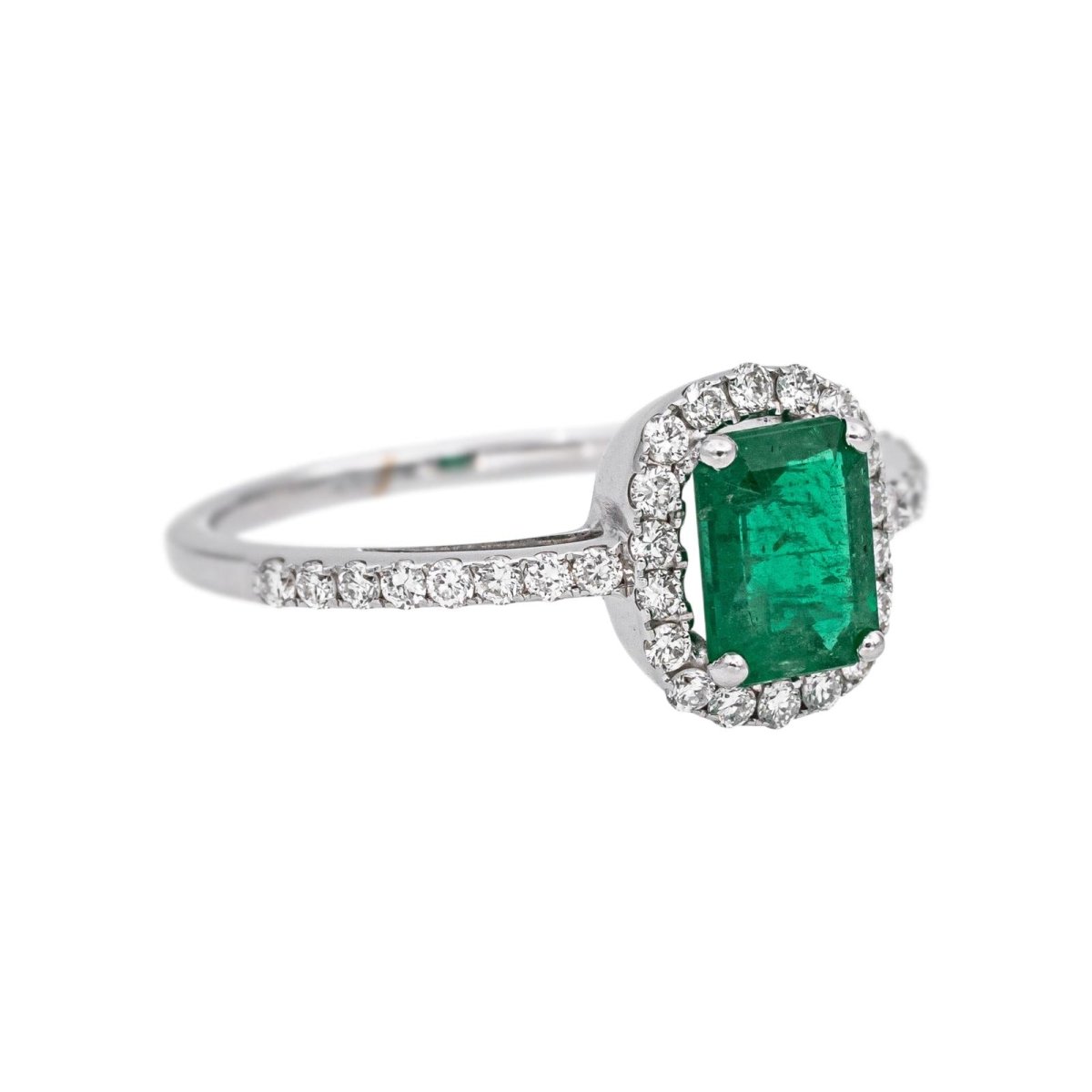 Bague Entourage en or blanc, émeraude et diamants - Castafiore