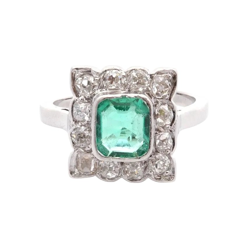 Bague Entourage en or blanc, émeraude et diamants - Castafiore