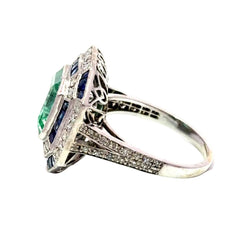 Bague Entourage en or blanc, émeraude, saphir et diamants - Castafiore