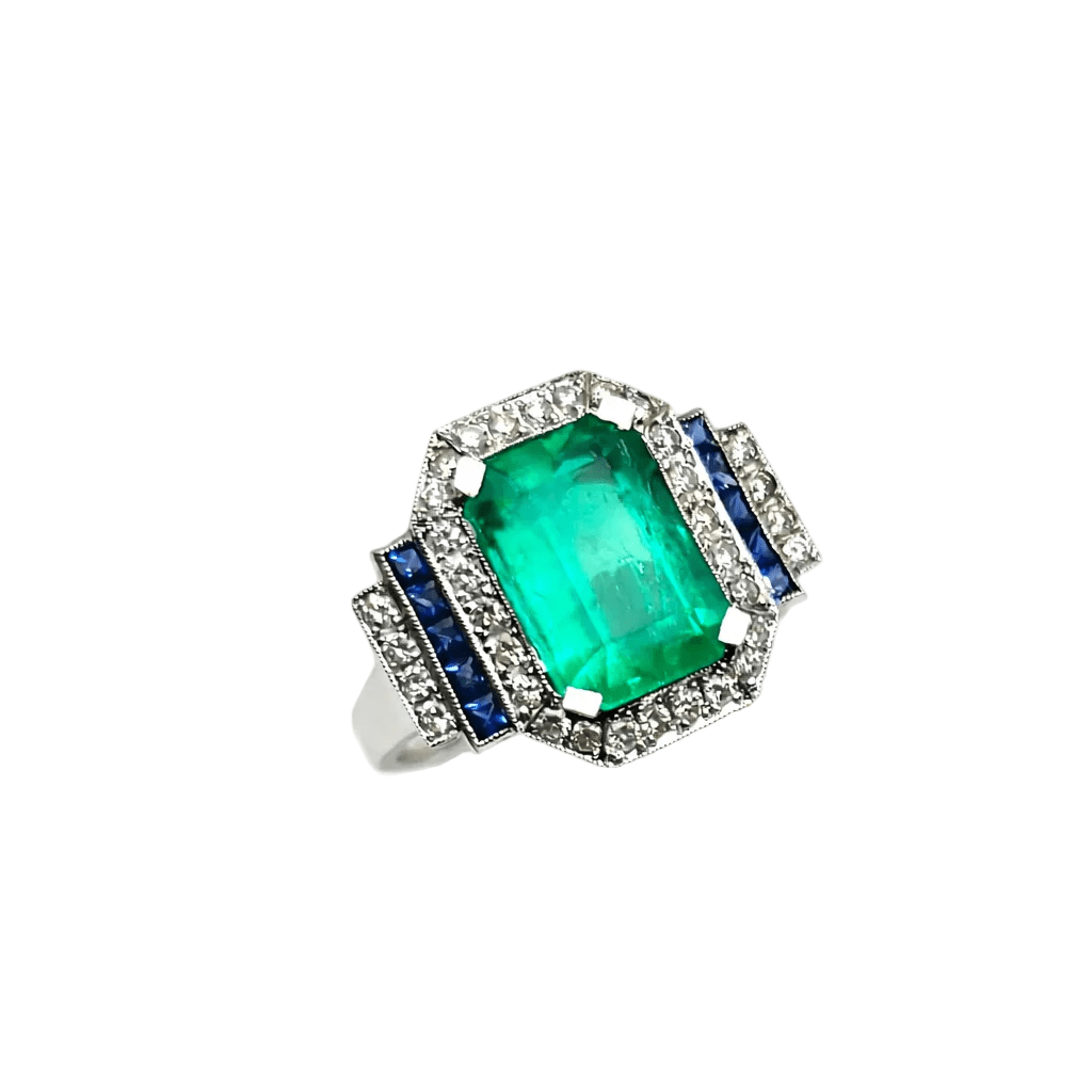 Bague Entourage en or blanc, émeraude, saphirs et diamants - Castafiore