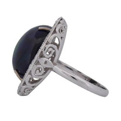 Bague Entourage en or blanc, opale et diamants - Castafiore